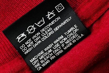 икони върху дрехи за пране какво означават